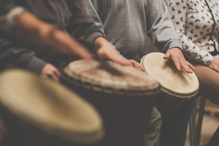 bigstock Group of people playing on dru 313340536WEB2 lets drum